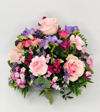 <h2>Lilac and Pink Classic Posy | Funeral Flowers</h2>
<ul>
<li>Approximate Size W 25cm H 35cm</li>
<li>Hand created lilac and pink posy in fresh flowers</li>
<li>To give you the best we may occasionally need to make substitutes</li>
<li>Funeral Flowers will be delivered at least 2 hours before the funeral</li>
<li>For delivery area coverage see below</li>
</ul>
<h2><br />Liverpool Flower Delivery</h2>
<p>We have a wide selection of Funeral Posies offered for Liverpool Flower Delivery. Funeral posies can be provided for you in Liverpool, Merseyside and we can organize Funeral flower deliveries for you nationwide. Funeral Flower can be delivered to the Funeral directors or a house address. They can not be delivered to the crematorium or the church.</p>
<br>
<h2>Flower Delivery Coverage</h2>
<p>Our shop delivers funeral flowers to the following Liverpool postcodes L1 L2 L3 L4 L5 L6 L7 L8 L11 L12 L13 L14 L15 L16 L17 L18 L19 L24 L25 L26 L27 L36 L70 If your order is for an area outside of these we can organise delivery for you through our network of florists. We will ask them to make as close as possible to the image but because of the difference in stock and sundry items, it may not be exact.</p>
<br>
<h2>Liverpool Funeral Flowers | Posies</h2>
<p>This beautiful posy has been loving handcrafted by our florist. A classic selection in lilac and pink including large-headed roses, freesias, lisianthus and spray chrysanthemums presented in a posy design.</p>
<br>
<p>Funeral posies are suitable as funeral flowers and as tribute gifts to the bereaved family. The Funeral posy is flowers arranged in a circular shape. In the case of cremation, the family may like individual posies which can also be used as table decorations at the wake.</p>
<br>
<p>Contents of the Large Posy:35cm Posy Pad, 4 Pink Roses, 2 Pink Spray Roses, 2 Purple Lisianthus, 3 Lilac Freesia, 4 Pink Carnations, 2 Pink Spray Chrysanthemums, 2 Green Bupleurum and Lilac September Flower with mixed Foliage.</p>
<br>
<h2>Best Florist in Liverpool</h2>
<p>Trust Award-winning Liverpool Florist, Booker Flowers and Gifts, to deliver funeral flowers fitting for the occasion delivered in Liverpool, Merseyside and beyond. Our funeral flowers are handcrafted by our team of professional fully qualified who not only lovingly hand make our designs but hand-deliver them, ensuring all our customers are delighted with their flowers. Booker Flowers and Gifts your local Liverpool Flower shop.</p>
<p><br /><br /><br /></p>
<p><em>Vivian Hart - Review from Facebook - Funeral Flowers Liverpool</em></p>
<br>
<p><em>This 5 Star review was from Facebook - Booker Flowers and Gifts - Reviews Facebook</em></p>
<br>
<p><em>Visited Booker Flowers as my usual florist was closed. Ordered funeral flowers. The advice and customer service we were given was excellent. The flowers exceeded our expectations - will be using Booker Flowers in the future - Thank you</em></p>
<br>